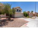 Exterior of a charming house with a brick pathway and well-maintained front yard landscaping at 3821 W Barcelona Dr, Chandler, AZ 85226