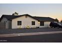 Attractive single-story home with desert landscaping, offering great curb appeal at 4755 E Gary St, Mesa, AZ 85205