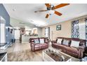 Inviting living room with comfortable seating and plenty of natural light at 597 S 167Th Dr, Goodyear, AZ 85338