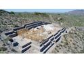 New construction of a home, situated on a hillside with layered terracing at 39307 N Silver Saddle Dr, Carefree, AZ 85377