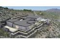 Modern home with desert landscaping, tiered terraces, pool and beautiful mountain views at 39307 N Silver Saddle Dr, Carefree, AZ 85377