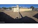 A vacant backyard is visible, ready for renovation or landscaping opportunities at 4304 N 55Th Dr, Phoenix, AZ 85031