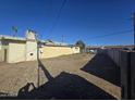 A large vacant backyard shows space for a new build or landscaping at 4304 N 55Th Dr, Phoenix, AZ 85031