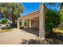 Spacious covered carport with ample parking space and convenient access to the home's entrance at 6035 N 9Th Ave, Phoenix, AZ 85013