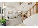 Spacious foyer with high ceilings, staircase, neutral tones, and open layout at 1753 N St Francis Pl, Casa Grande, AZ 85122