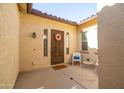 Cozy front porch featuring a wreath, welcome mat, and seating area at 19598 E Walnut Rd, Queen Creek, AZ 85142