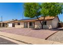 Charming single-story home featuring a low maintenance yard and solar panels at 4134 W Camino Acequia --, Phoenix, AZ 85051