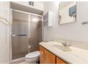 Bathroom featuring a shower and vanity, providing functionality and comfort at 4553 N 54Th Ave, Phoenix, AZ 85031