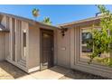 A close up of the front door including address and a security screen at 10115 W Turney Ave, Phoenix, AZ 85037
