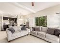 Open-concept living room flows into the kitchen with lots of windows and natural light at 14000 N 94Th St # 2187, Scottsdale, AZ 85260