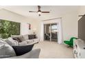 Inviting living room with plush seating, lots of light, and a ceiling fan at 14000 N 94Th St # 2187, Scottsdale, AZ 85260