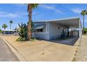 Charming home with attached carport, desert landscaping, and beautiful curb appeal at 2650 W Union Hills Dr # 215, Phoenix, AZ 85027