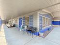 Spacious covered patio featuring comfortable seating and stylish accents for relaxing outdoors at 3515 E Kings Ave, Phoenix, AZ 85032
