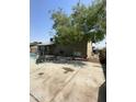 Spacious backyard featuring a pool and outdoor seating area at 4316 W Rose Ln, Glendale, AZ 85301