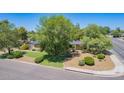 Desirable home with mature landscaping and a large front yard at 6330 E Delcoa Ave, Scottsdale, AZ 85254