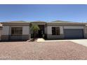 Inviting single-Gathering home featuring desert landscaping and a two-car garage at 81 E Smoke Tree Rd, Gilbert, AZ 85296