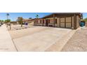 Attractive single-story house with a convenient combination driveway, enhancing functionality and curb appeal at 18217 N 34Th Ave, Phoenix, AZ 85053