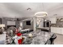 Open-concept dining area seamlessly connecting to living spaces and kitchen at 2749 W San Juan Ave, Phoenix, AZ 85017