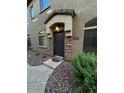 Attractive front entrance with stone accents and covered entryway at 1350 S Greenfield Rd # 1219, Mesa, AZ 85206