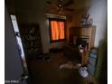 Bedroom features natural light, ceiling fan, and a built-in desk at 14214 N 36Th Ave, Phoenix, AZ 85053