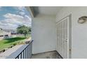 Cozy balcony view of green lawn and sky through the decorative door at 4776 W Eva St, Glendale, AZ 85302