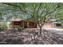 Inviting home featuring a well-maintained landscape and front yard at 1844 W Virginia Ave, Phoenix, AZ 85007