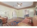 Bright and airy living room with hardwood floors, fireplace, and archway leading to other rooms at 1813 E Willetta St, Phoenix, AZ 85006