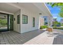 Inviting outdoor space featuring a covered patio, tile flooring, and stylish architecture at 3718 E Sells Dr, Phoenix, AZ 85018