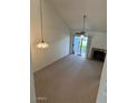 Bright living room featuring a fireplace and sliding doors leading to the yard at 14002 N 49Th Ave # 1021, Glendale, AZ 85306