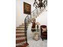 Foyer with a beautiful staircase and ornate decor at 4316 N 40Th St, Phoenix, AZ 85018
