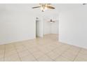 Spacious living room featuring neutral paint and tiled floors at 2745 E Dahlia Dr, Phoenix, AZ 85032