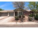 Inviting single-Gathering home with desert landscaping, a driveway, and a neutral color scheme at 6610 E University Dr # 163, Mesa, AZ 85205