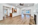 Bright living room featuring hardwood floors, recessed lighting, and an open layout at 6615 E Phelps Rd, Scottsdale, AZ 85254