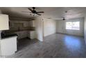 Open floor plan showcasing the updated kitchen and living area at 3143 W Glendale Ave, Phoenix, AZ 85051