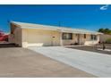 Charming single-story home with a well-maintained front yard and attached garage at 509 N 56 St, Mesa, AZ 85205