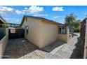 Exterior view of the property's rear, showcasing a private yard area and well-maintained surroundings at 2601 N 51St St, Phoenix, AZ 85008