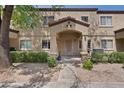 Charming home with neutral stucco, a covered entryway, and neatly trimmed bushes at 125 S 56Th St # 27, Mesa, AZ 85206