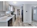 Efficient kitchen with sleek, modern appliances, stylish countertops, and light gray cabinets at 320 E Mckellips Rd # 4, Mesa, AZ 85201
