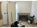 Cozy living room with a fireplace and tile floors, perfect for relaxing at 3324 W Mcrae Way # 2, Phoenix, AZ 85027