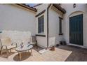 Cozy outdoor patio space with a charming table and chairs perfect for relaxation at 4135 E Grand Canyon Dr, Chandler, AZ 85249