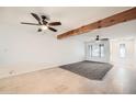 Bright living room showcasing neutral toned walls, tile flooring, and abundant natural light at 2164 E Jerome Ave, Mesa, AZ 85204