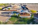 Community park featuring a playground, volleyball court, and green space at 12599 W Mountain View Dr, Avondale, AZ 85323