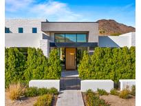 Modern home with clean lines and a landscaped front yard at 6554 N 40Th Pl, Paradise Valley, AZ 85253