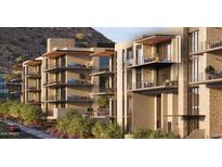 Modern condo building showcasing private balconies with sleek railings and views at 4849 N Camelback Ridge Rd # A409, Scottsdale, AZ 85251