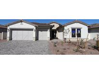 Charming single-Gathering home featuring a three car garage and low-maintenance desert landscaping at 12312 W Luxton Ln, Avondale, AZ 85323