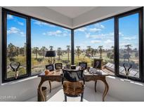 Luxurious home office boasts stunning golf course views at 1040 E Osborn Rd # 302, Phoenix, AZ 85014