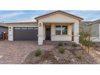 New single-story home with attached garage and landscaped front yard at 40105 W Elm Dr, Maricopa, AZ 85138