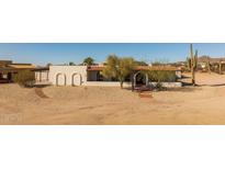 Single story home with architectural details and desert landscaping at 8320 E Quill St, Mesa, AZ 85207