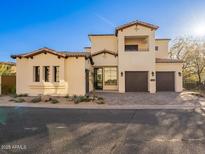 Stunning two-story home with desert landscaping and a three car garage at 3955 E Sierra Vista Dr, Paradise Valley, AZ 85253