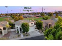 Two-story house with a large backyard and park views at 1521 W Commerce Ave, Gilbert, AZ 85233